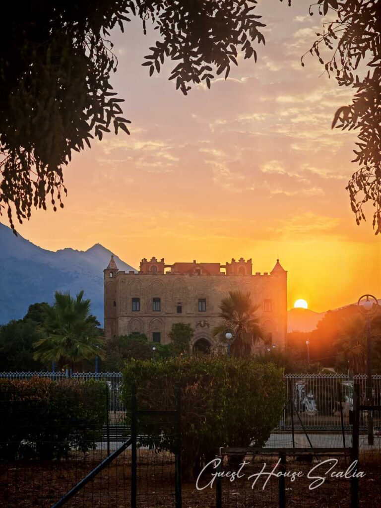 The Zisa Castle of Palermo 1 Exterior view of the Zisa Palace in Palermo, a masterpiece of Arab-Norman architecture, captured at sunset.