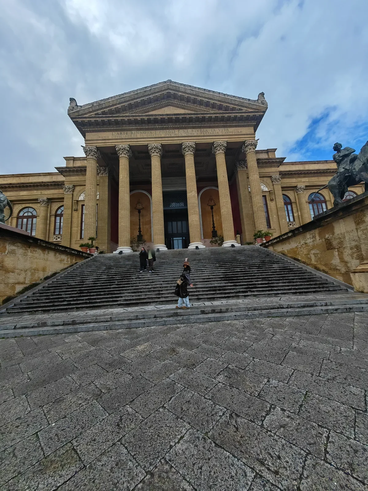 What to See in Palermo in One Day: A Walking Itinerary Through the Old Town 1 The staircase and colonnade of Teatro Massimo opera house in Palermo